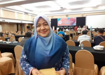 Nila Kartika.