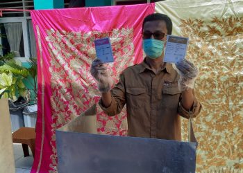 Amnasmen memberikan hak suara di TPS.