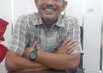 Helmi Moesim.